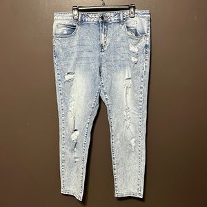 Distressed straight leg jeans.
